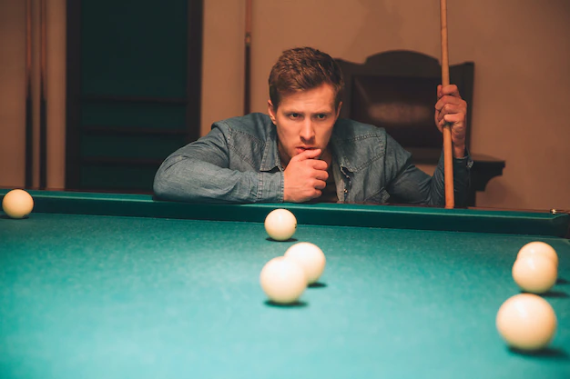 Serious Concentrated Young Man Thinking He Look Billiard Balls Bed Table Guy Hold Billiard Cue He Is Alone Room 152404 4084