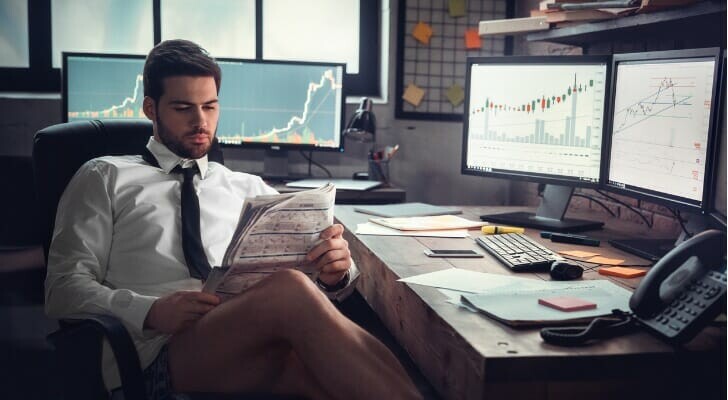 2019 08 Young Male Trader At Office Work Concept Sitting In Underwear Reading Picture Id1130771058
