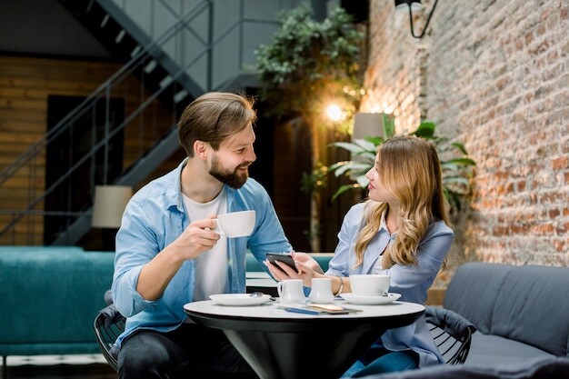 Happy Couple Friends Flirting Talking Drinking Coffe Restaurant Cafe Waiting Room 161094 2576 (1)