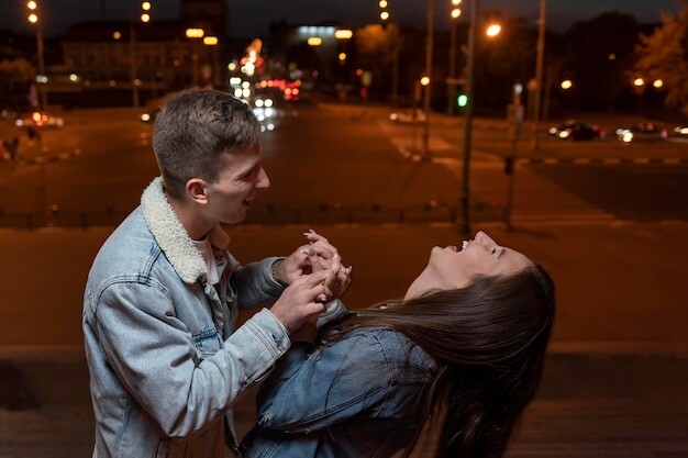 Young Couple Is Having Fun Laughing Evening City Background Romantic Date 134398 17022