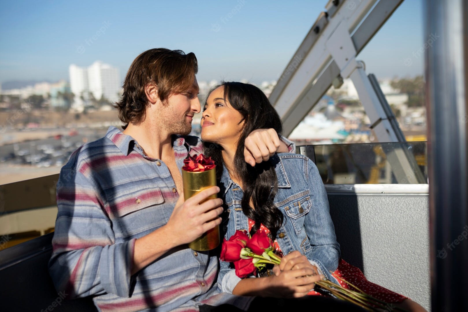 Young Couple Out Date Riding Ferris Wheel While Holding Roses Gift 23 2149274392