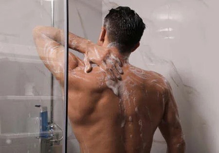 171151950 Man Taking Shower With Gel At Home